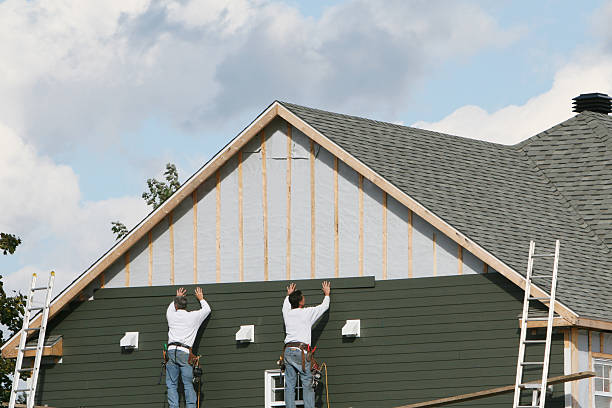 Professional Storm Damage Siding Repair technician working in Industry, PA